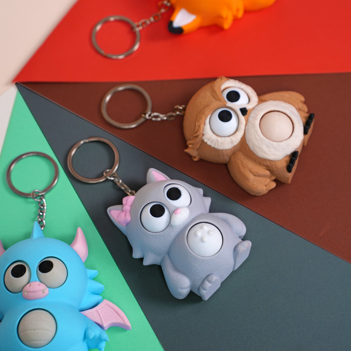 Móc Khóa Twisty Pets – Mắt & Bụng Xoay Linh Hoạt