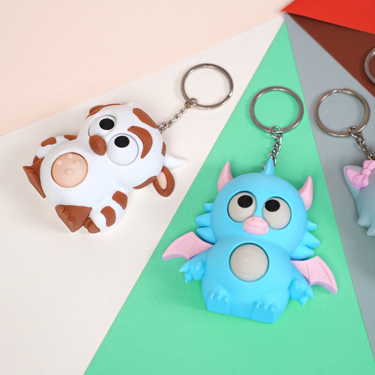 Móc Khóa Twisty Pets – Mắt & Bụng Xoay Linh Hoạt