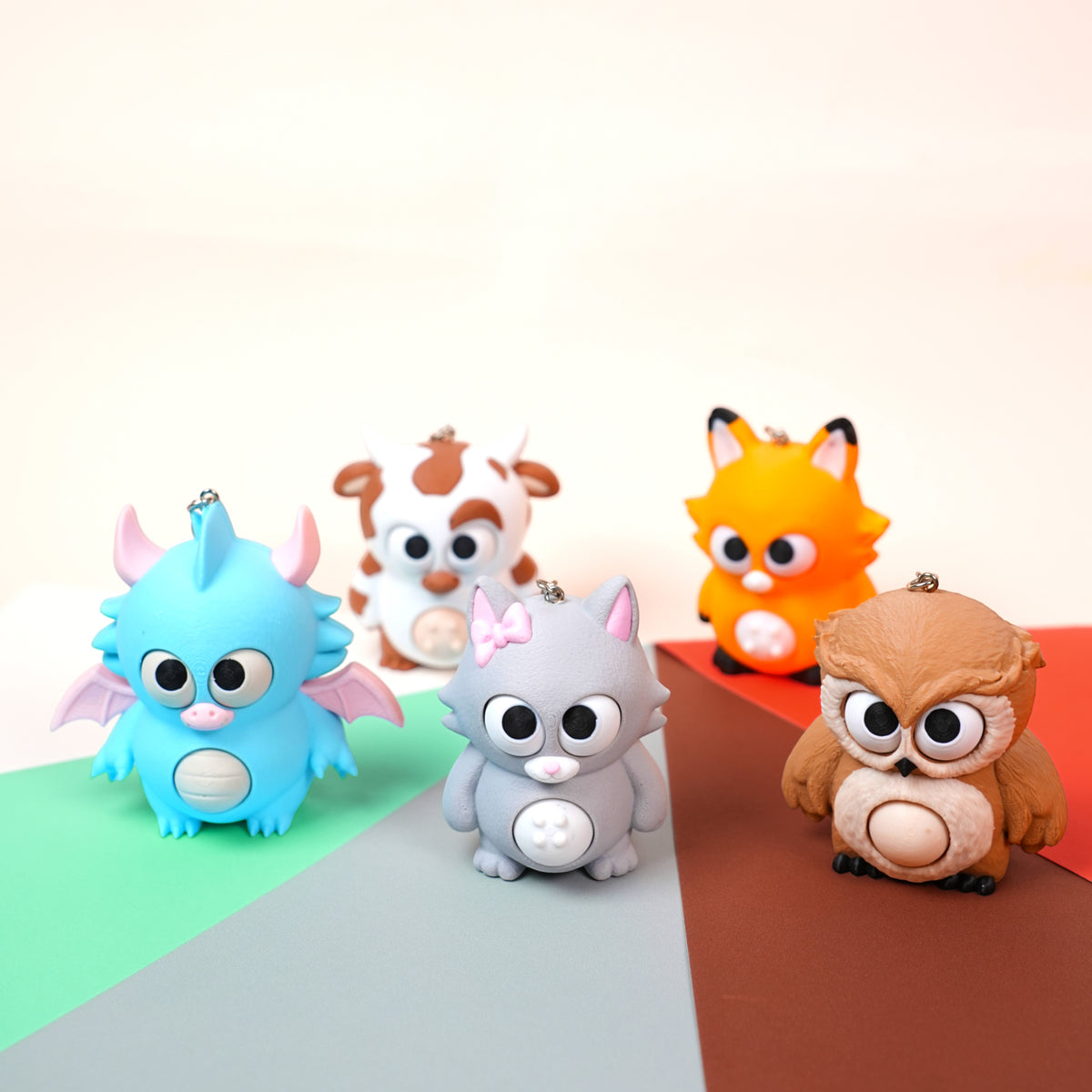 Móc Khóa Twisty Pets – Mắt & Bụng Xoay Linh Hoạt