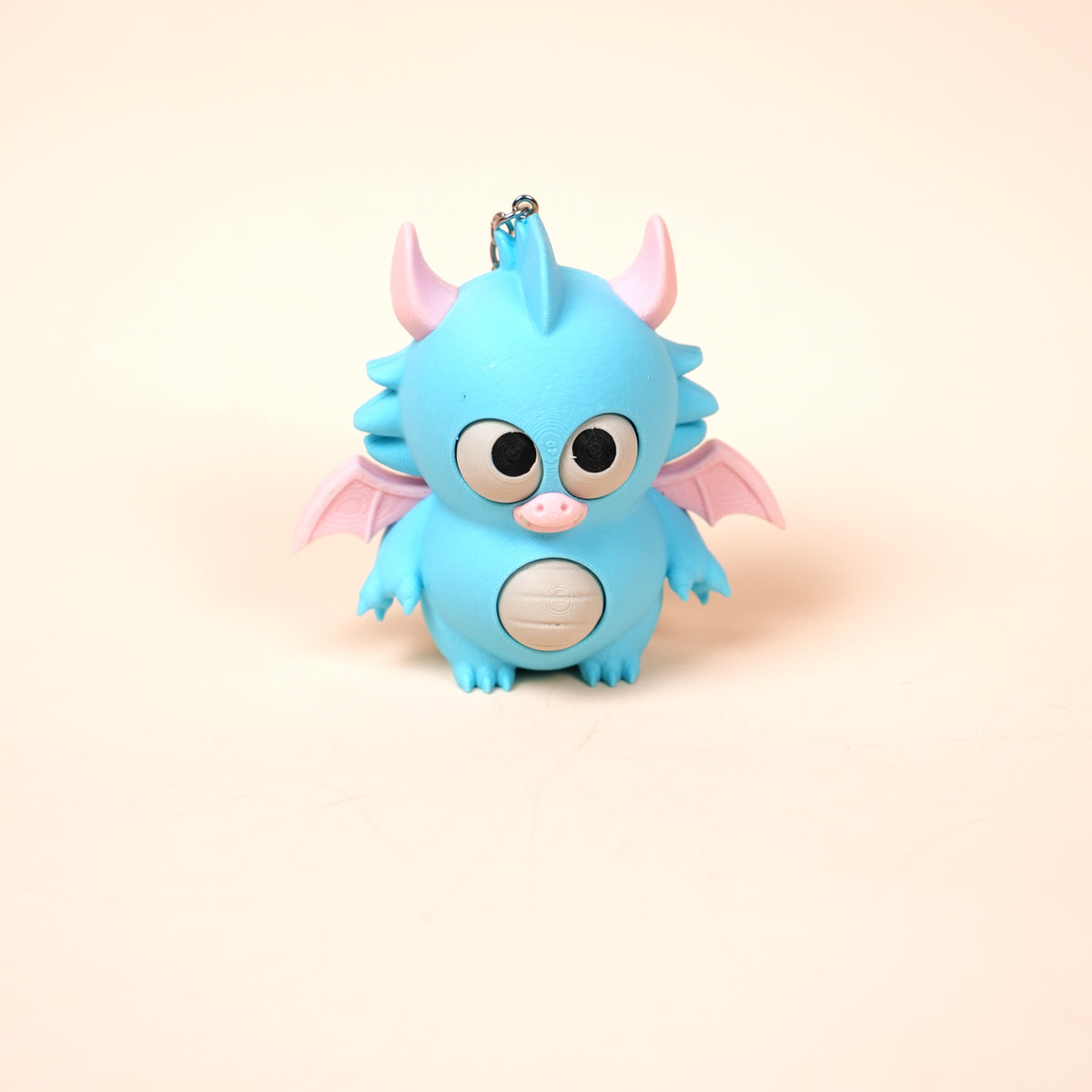 Móc Khóa Twisty Pets – Mắt & Bụng Xoay Linh Hoạt